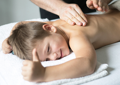 chinese-massage-therapy-for-kids-san-diego-acuipuncture-clinic-boy-being-mnassaged-with-thumbs-up chinese-massage-therapy-for-kids-san-diego-acuipuncture-clinic-boy-being-mnassaged-with-thumbs-up
